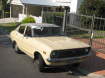 Enlarge Photo - Datsun 120Y - front view