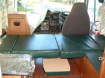 Enlarge Photo - Single bed set-up, with collapsible table stowed underneath.